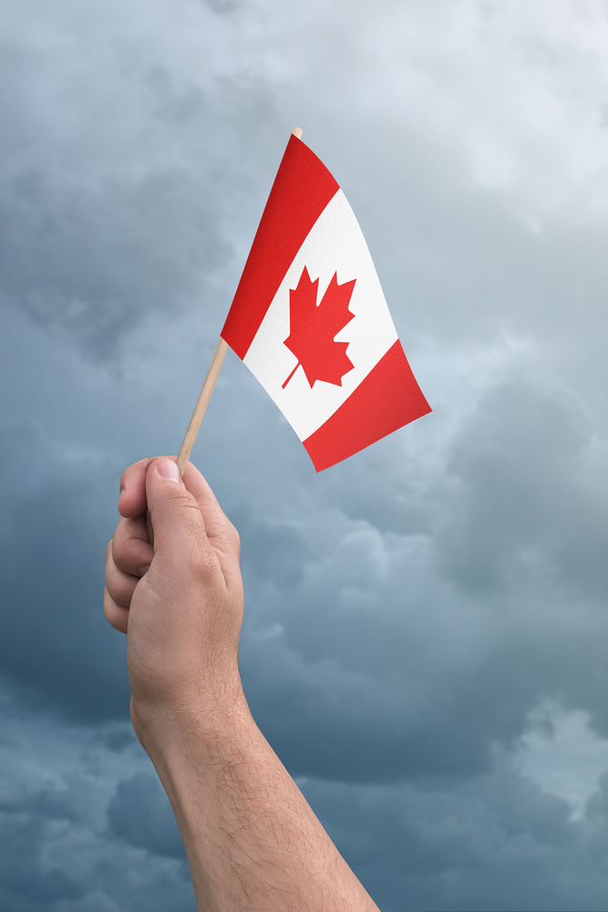Canada Flag held high